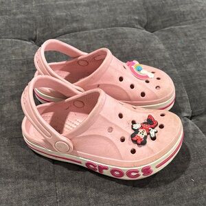 CROCS Kids Pink Clog Sandals with Minnie & Rainbow Charms